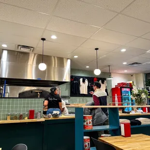 two people working in the kitchen