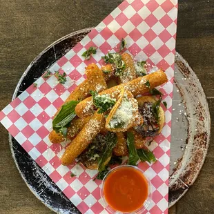 a plate of food on a wooden table