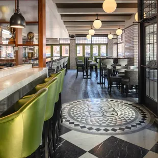 a view of the bar and dining area