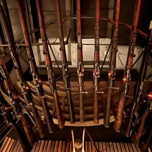 a large collection of guns on display