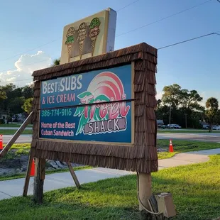 a sign on the side of the road