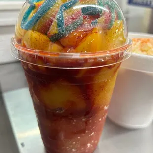 Mangonada with extra super fresh mango chunks and rainbow, gummy belts