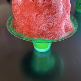 a close up of a pink ice cream