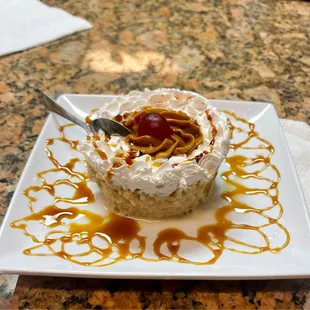 a desert dish with caramel sauce