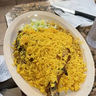 a plate of yellow rice