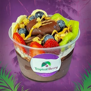 Organic Açaí topped with fresh cut fruits, peanut butter and granola.