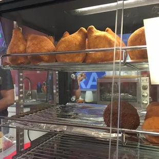 Savory Brazilian snacks (chicken on top and the beef and cheese ones on the bottom)