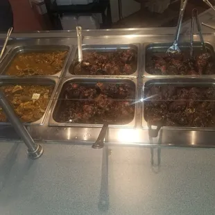 Jerk chicken, stew chicken, goat, etc.