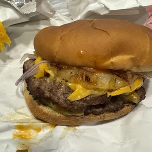 Tropical Bungalow burger - double cheeseburger with pineapple and red onion.