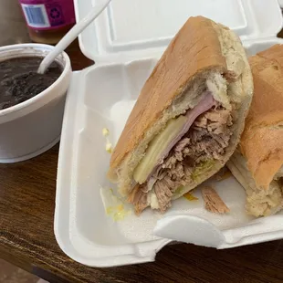Cuban sandwich and black beans - note that sandwich comes with mayo (never had it that way before).