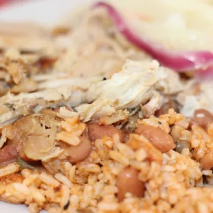 rice, roasted pork, and yucca