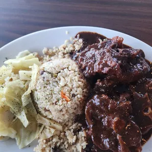 Oxtails, peas/rice cabbage