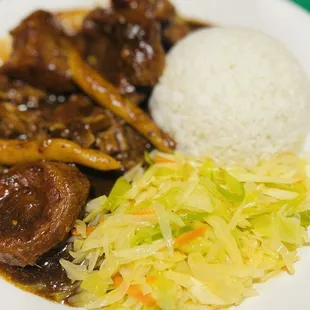 Entree: Oxtails with white Rice and Cabbage