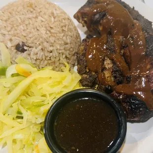 Entree: Jerk Chicken (small) with Cabbage, and Rice and Peas