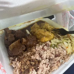 Half oxtail half chicken and rice and peas