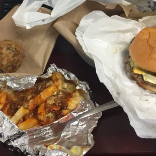 a hamburger and fries on a table