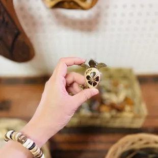 a hand holding a nut