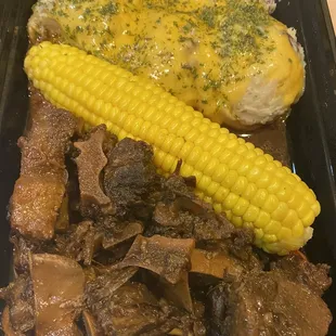 Med Oxtail with garlic mash and corn