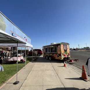 a food truck parked on the side of the road