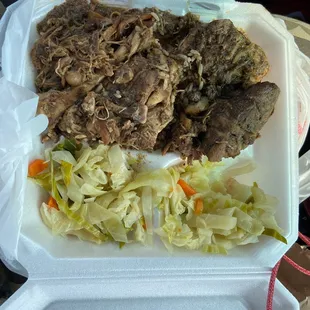 meat and vegetables in a styrofoam container