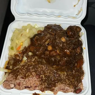 a meal in a styrofoam container