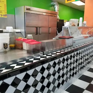 a checkered counter in a fast food restaurant