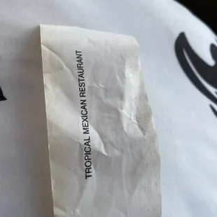 a piece of paper on a pillow