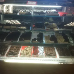 a display of a variety of desserts