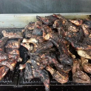 Our jerk chicken is done on the grill not in the oven!