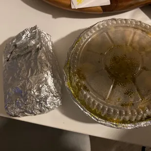a plate of food and a piece of foil
