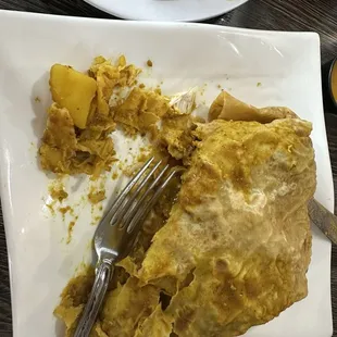Stewed Stew Oxtail and Boneless Curry Chicken Roti