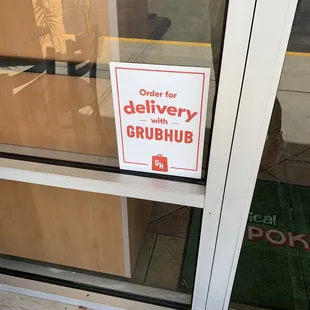 a sign in the window