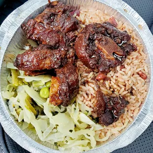 Regular size order of oxtail with rice &amp; peas and cabbage