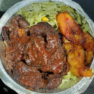 Jerk pork with cabbage and the sweetest plantains ever. Loved the island sauce on the pork!