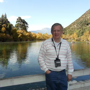 Daniel Oppliger in Lijiang, Yunnan China by Black Dragon Mountain.