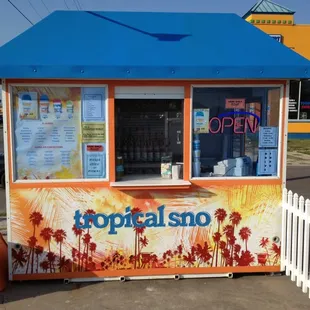 Look for the bright orange kiosk.