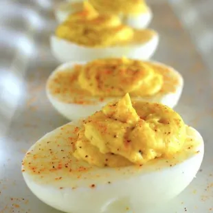 deviled eggs on a white plate