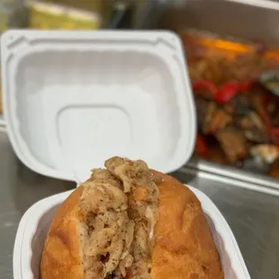 a sandwich in a styrofoam container
