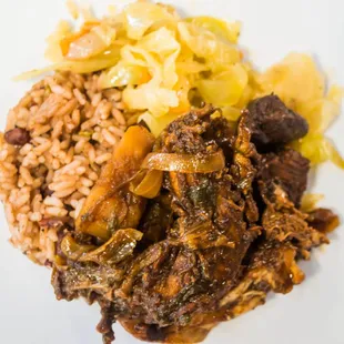 a plate of meat and rice