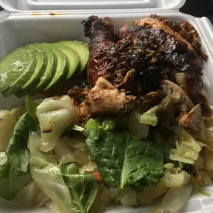 Jerk Chicken with steam vegetable and avocado.