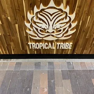 Tropical Tribe wooden carved sign