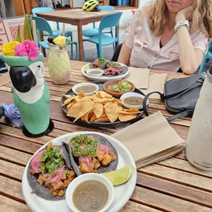 Fish tacos, chips and salsa, steak tacos. Sol tomato rum drink and pina colada.