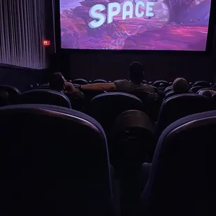 Waiting for the movie to start....small screen but, it's only $5 per person (don't expect luxury)