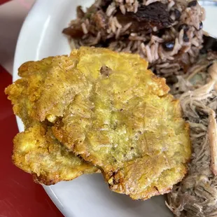 Amazing perfectly crisp Tostones ! Ask for mojo to dip .