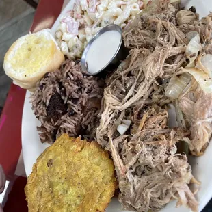 Amazing ! Tender pork flavorful sides a super filling dish. Always put some mojo sauce on the pork and dip your Tostones in the mojo.