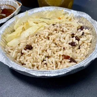 rice and meat in foil container