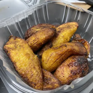 fried bananas in a plastic container