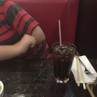 An idol drinking a coke
