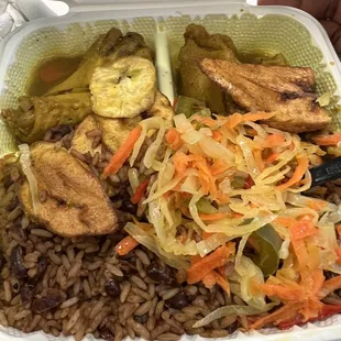 chicken, rice, and vegetables in a styrofoam container