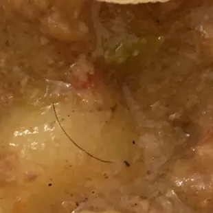 Hair in curry goat